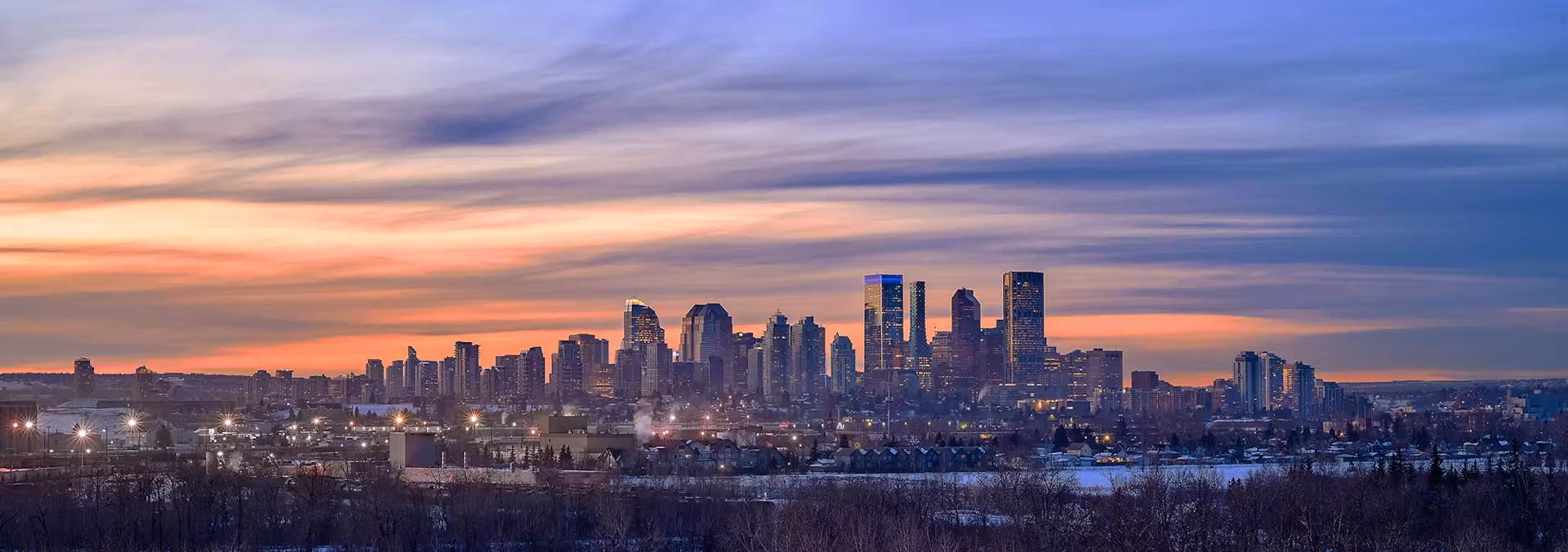 Calgary skyline representing local custom apparel service